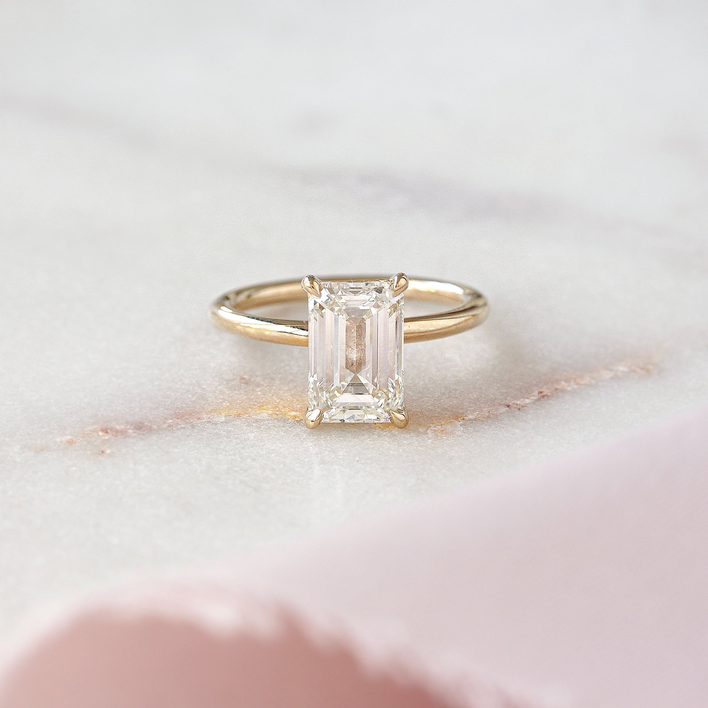 2 carat emerald cut solitaire yellow gold arya