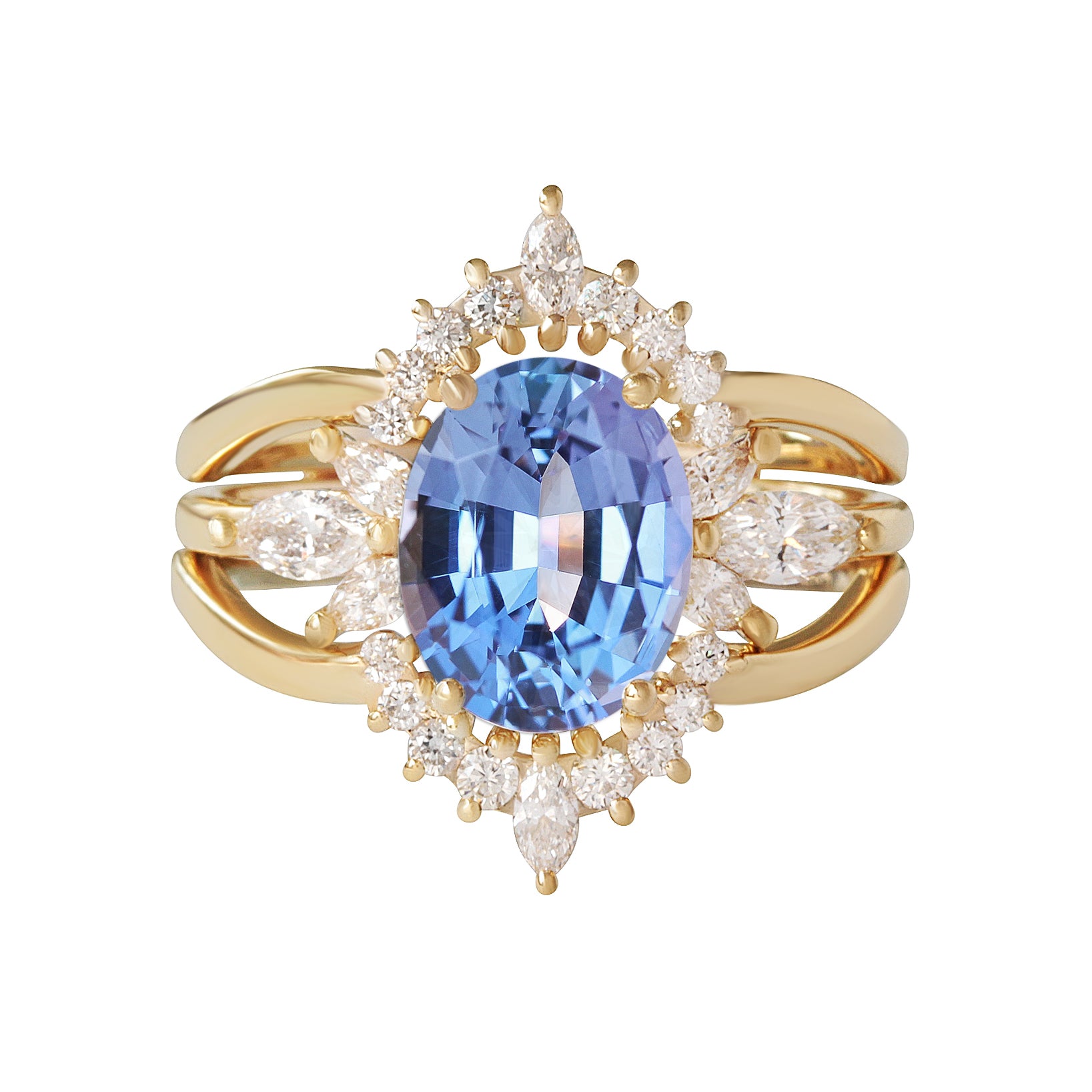 big oval tanzanite and diamond engagement ring with a yellow gold band and halo accent stones, accompanied by a matching ring guard.