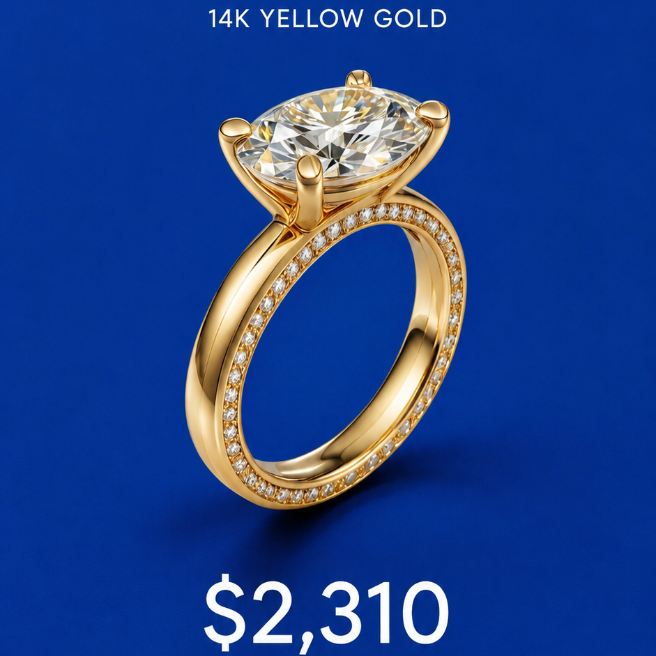 3-carat oval lab diamond engagement ring in 14K yellow gold. The ring is shown on a solid dark blue background with marketing text reading 'READY TO SHIP,' '3CT OVAL LAB DIAMOND EAST-WEST ENGAGEMENT RING,' 'Low Profile with Surprise Hidden Eternity Band,' and '14K YELLOW GOLD.