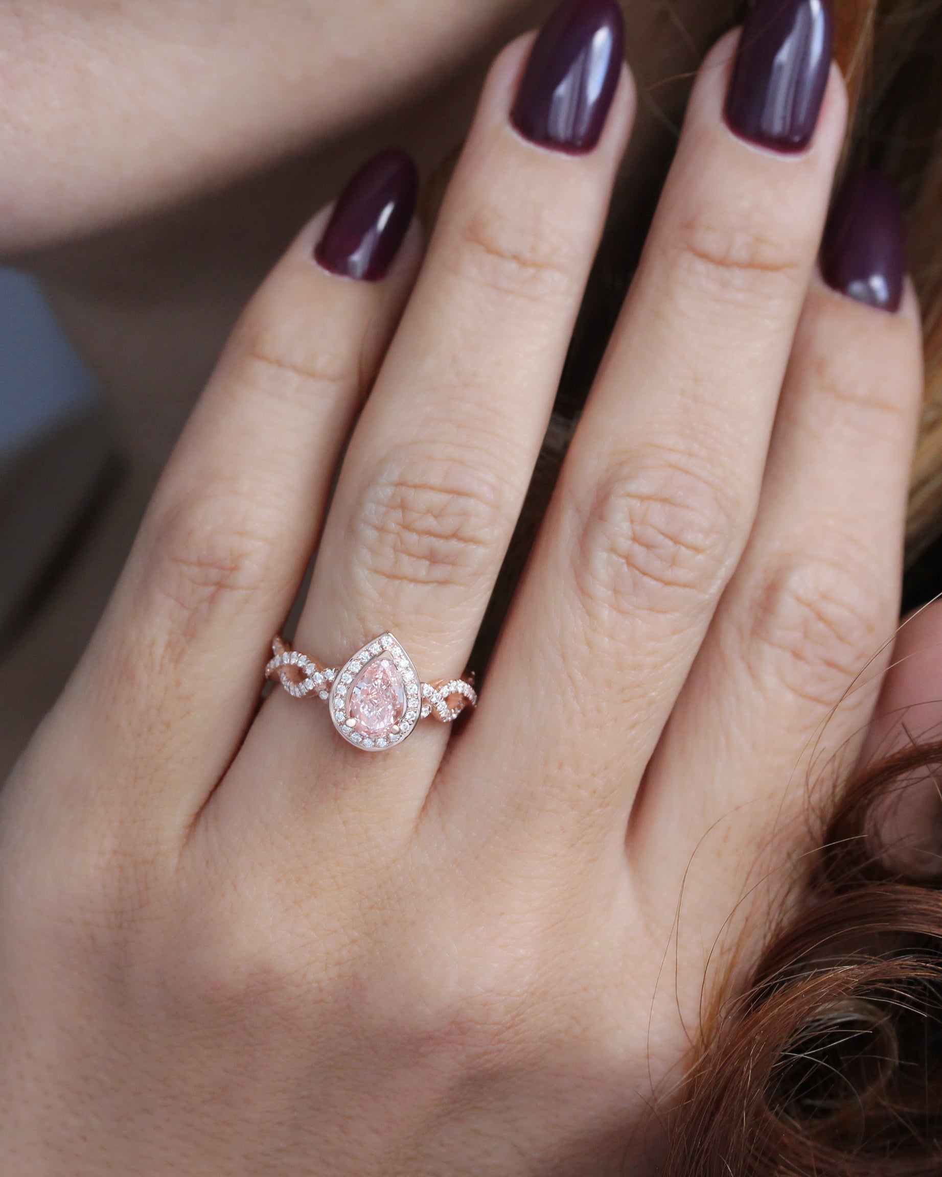 Pear Diamond Halo and Infinity Twist Shank Engagement Ring