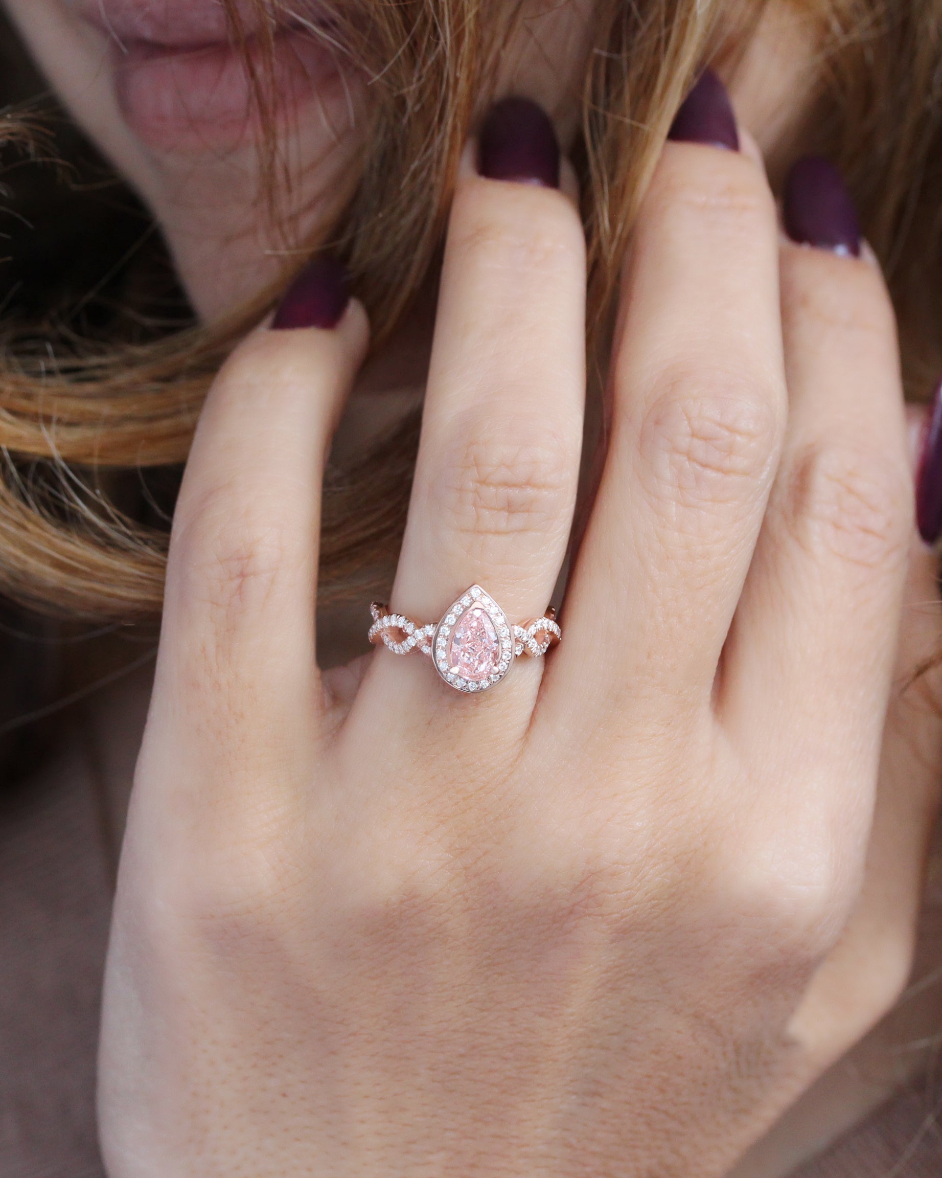 Pear Diamond Halo and Infinity Twist Shank Engagement Ring