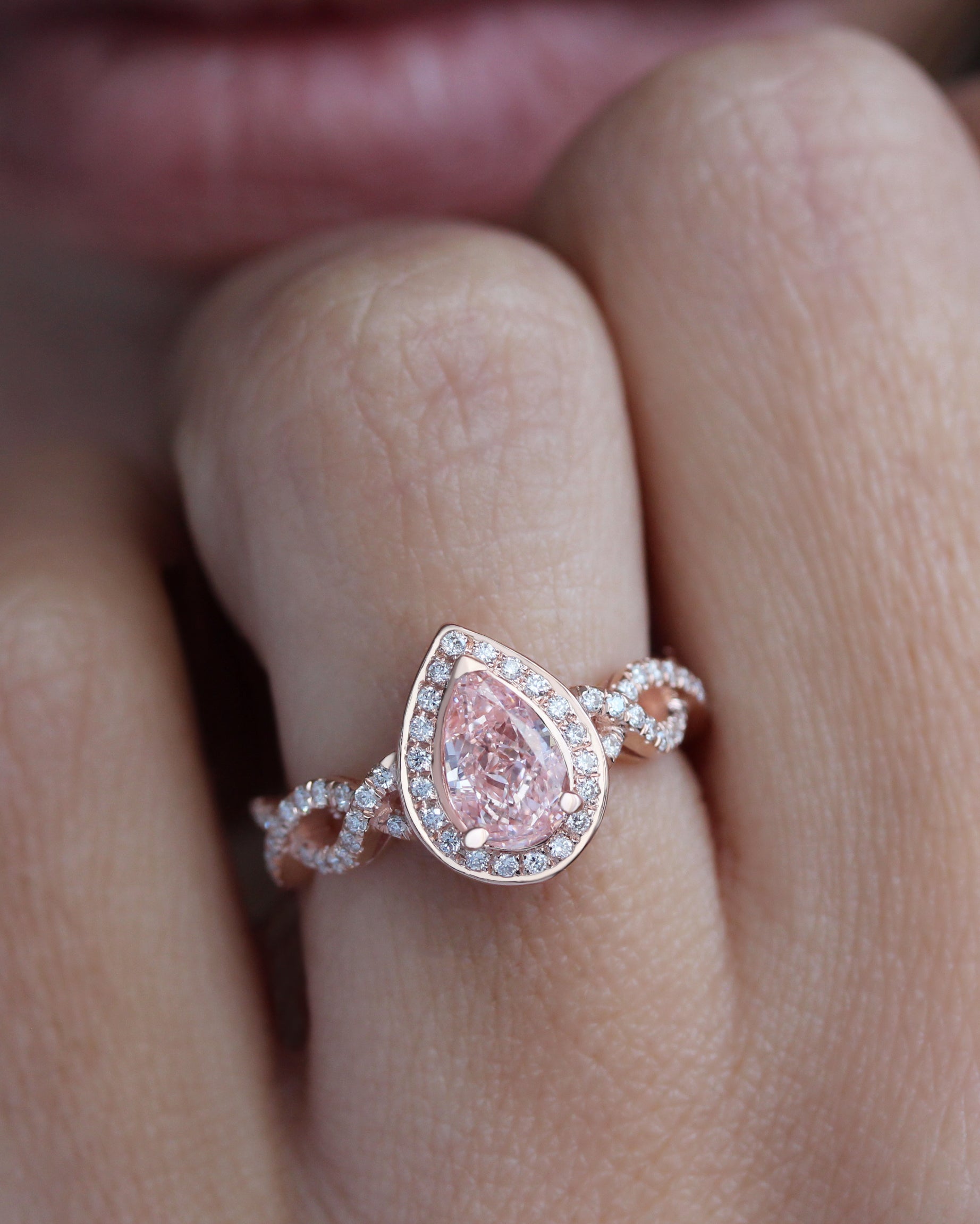Pear Diamond Halo and Infinity Twist Shank Engagement Ring