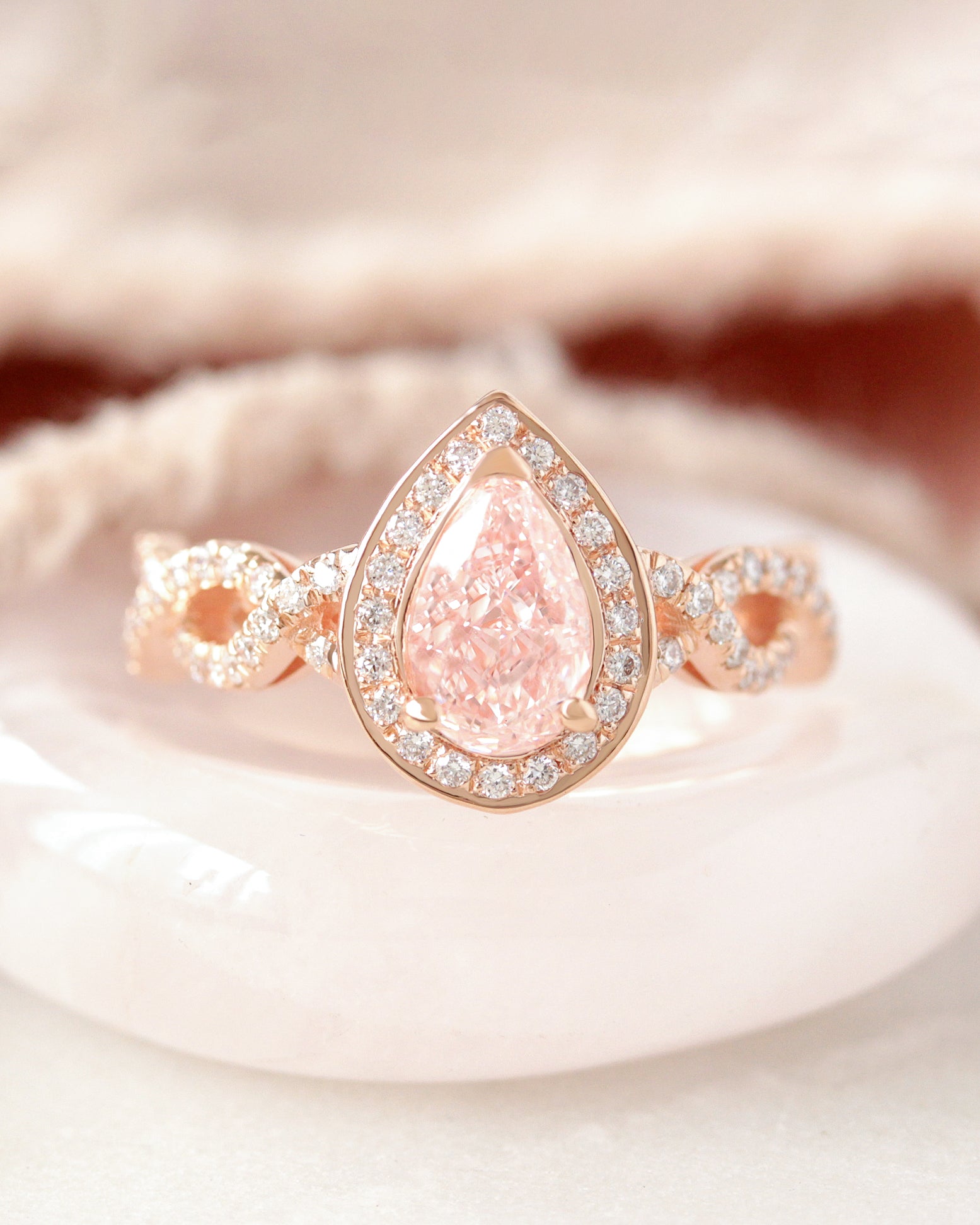 Pear Diamond Halo and Infinity Twist Shank Engagement Ring