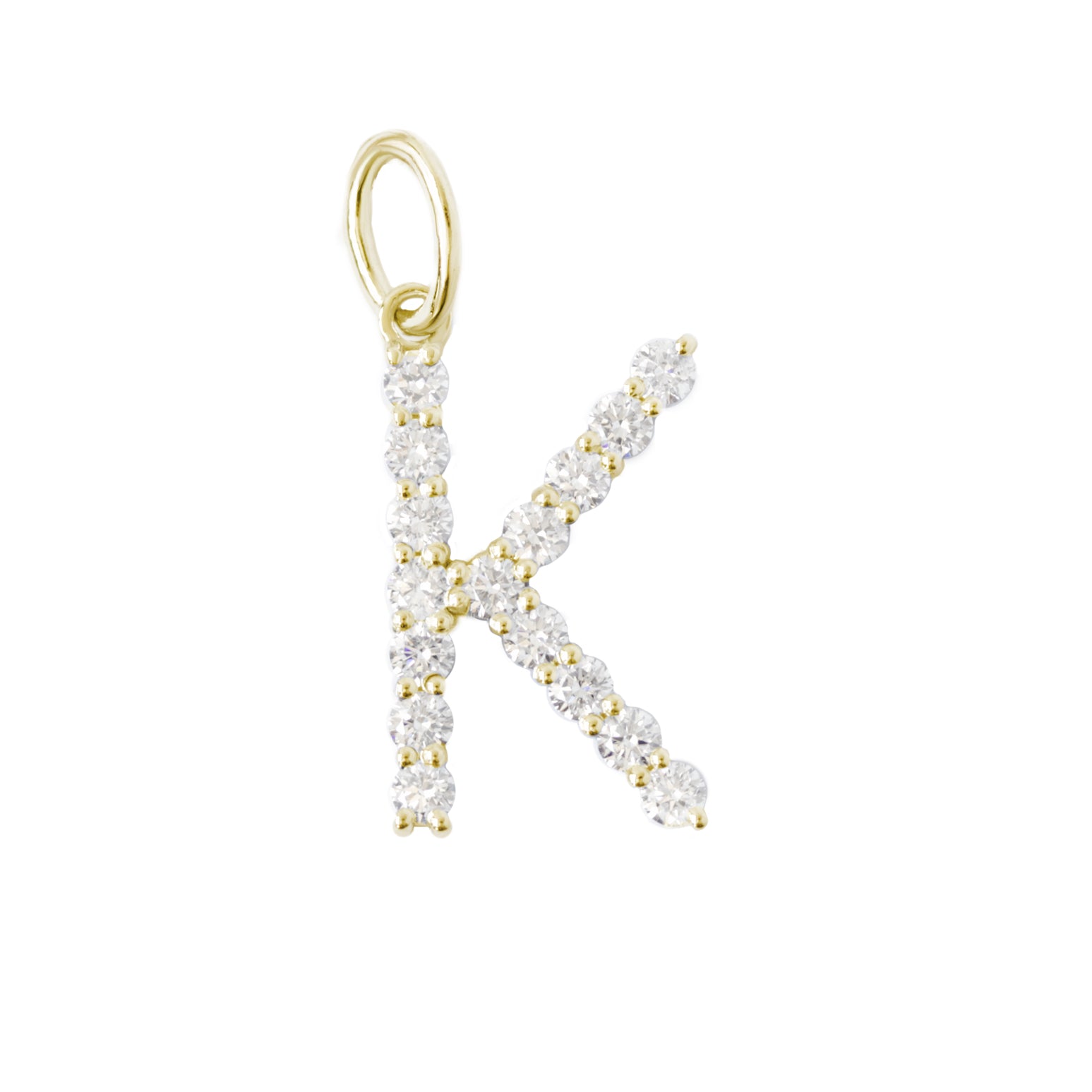 A gold-colored diamond initial charm in the shape of the letter K, adorned with small diamonds.