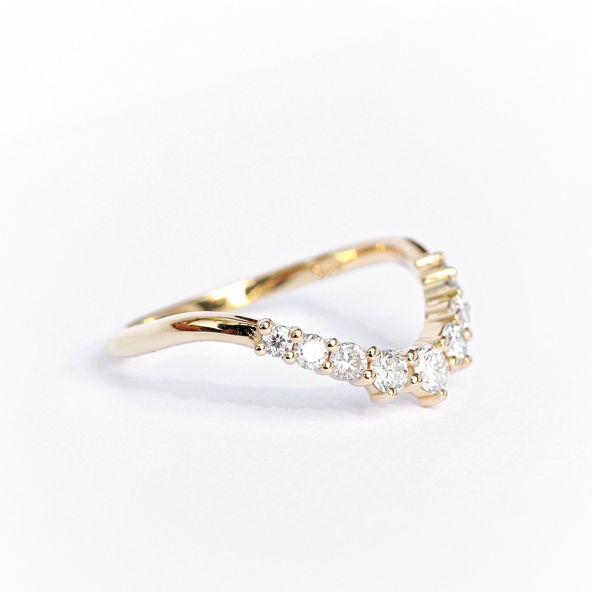 Big Diamonds unique curved wedding band