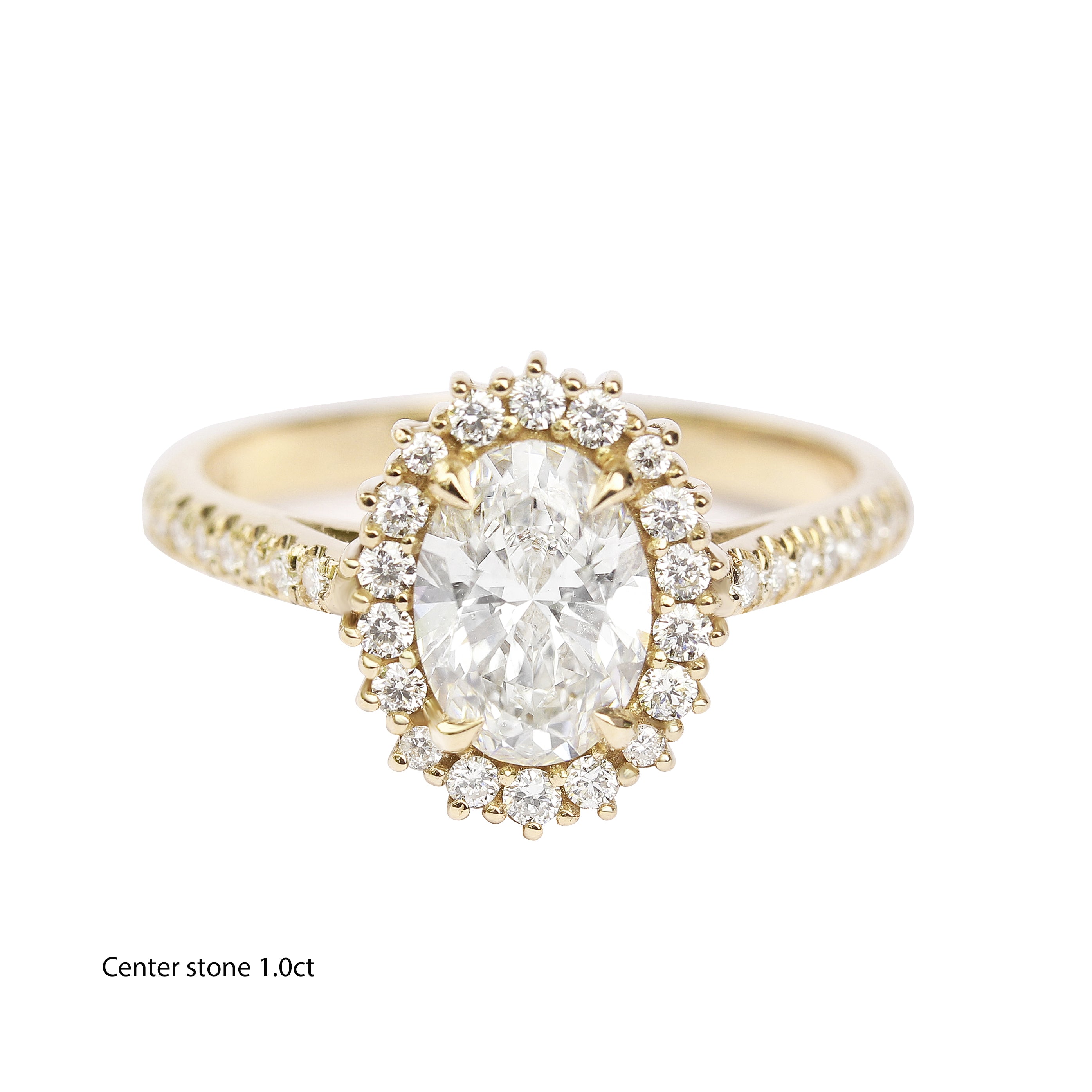 1CT oval diamond halo engagement ring with accent stones set in a gold band, the center diamond is surrounded by a halo of smaller diamonds.