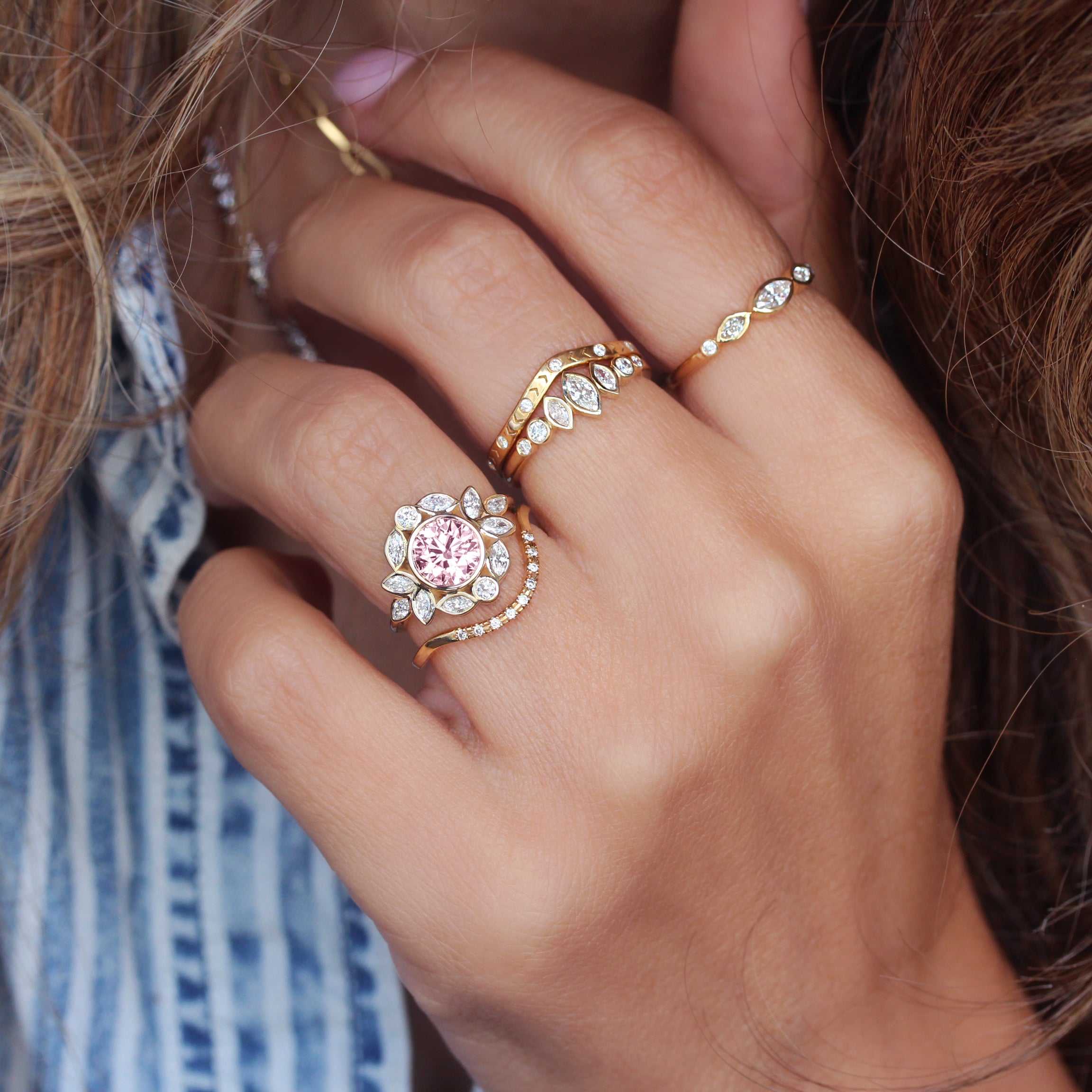 diamond engagement ring with round pink center stone