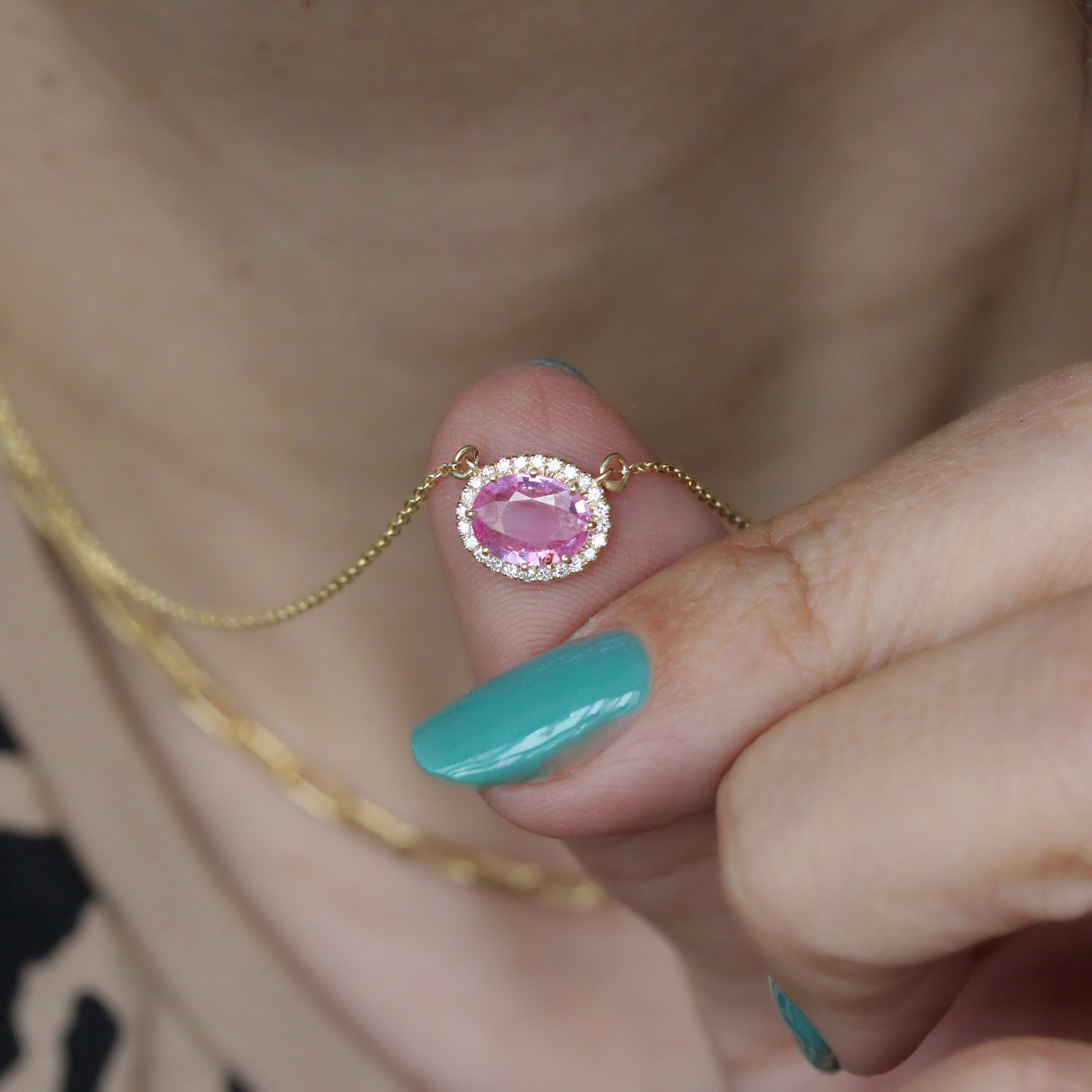 Oval Pink Sapphire and Diamond Halo Pendant Necklace