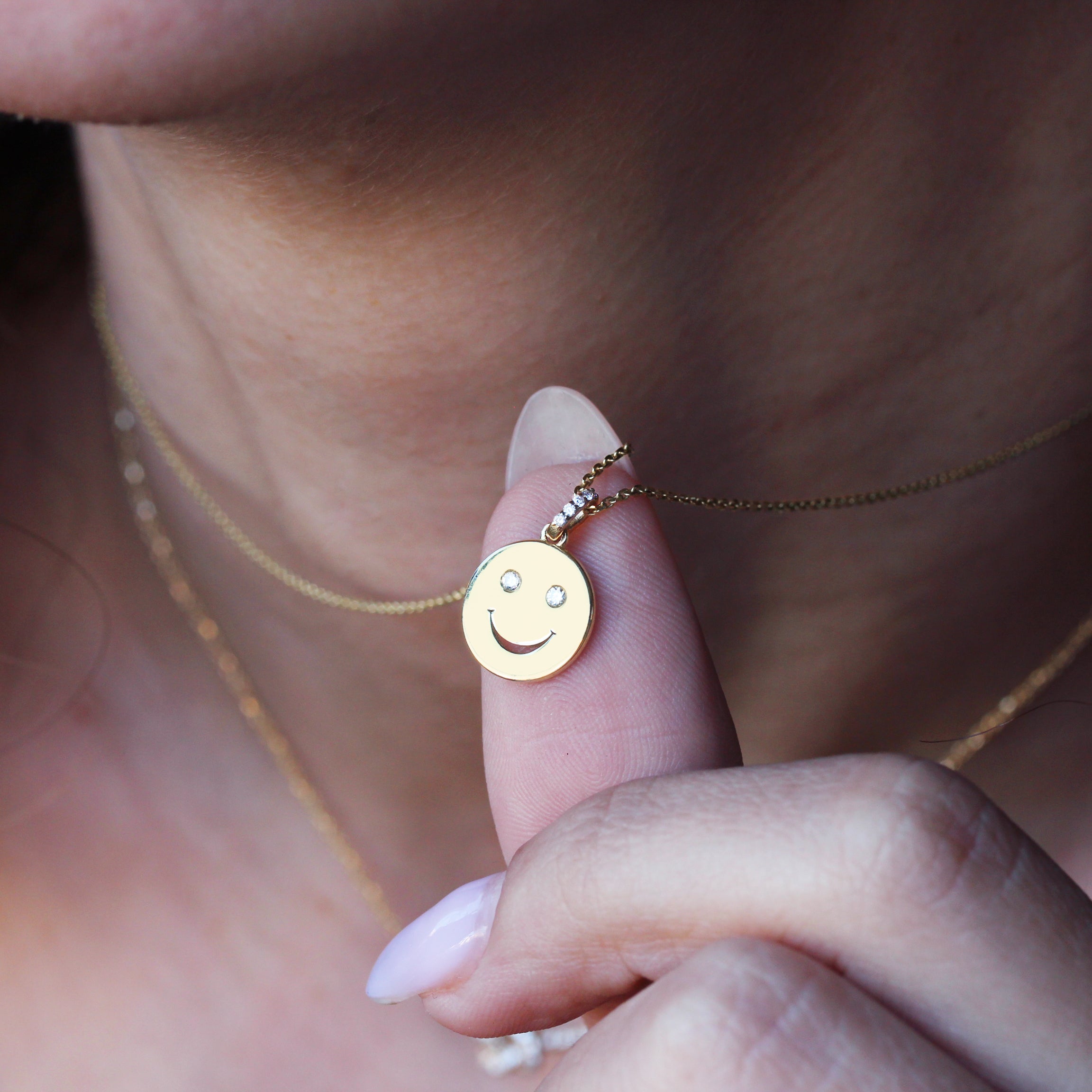 gold and diamond smile pendant yellow gold