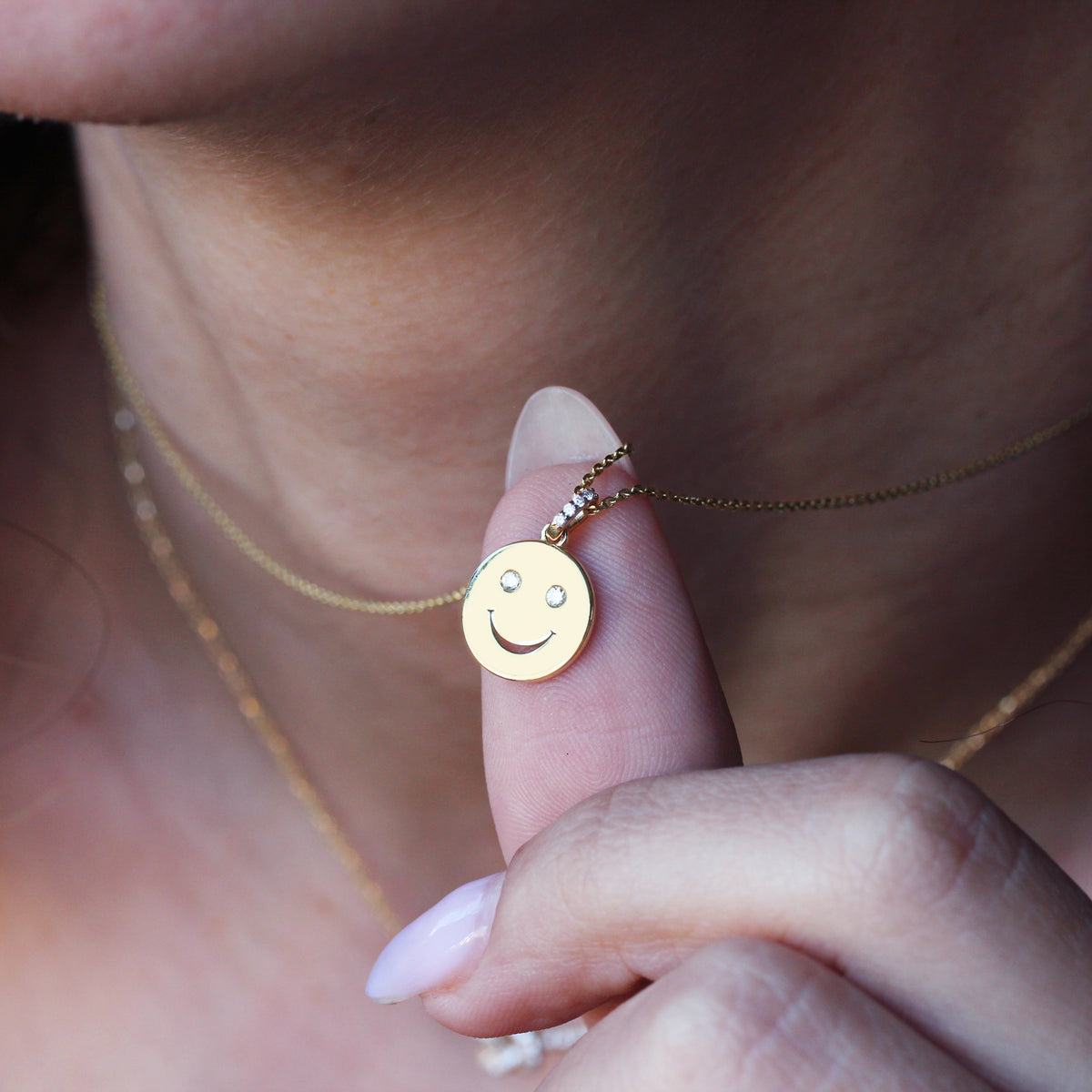 gold and diamond smile pendant yellow gold