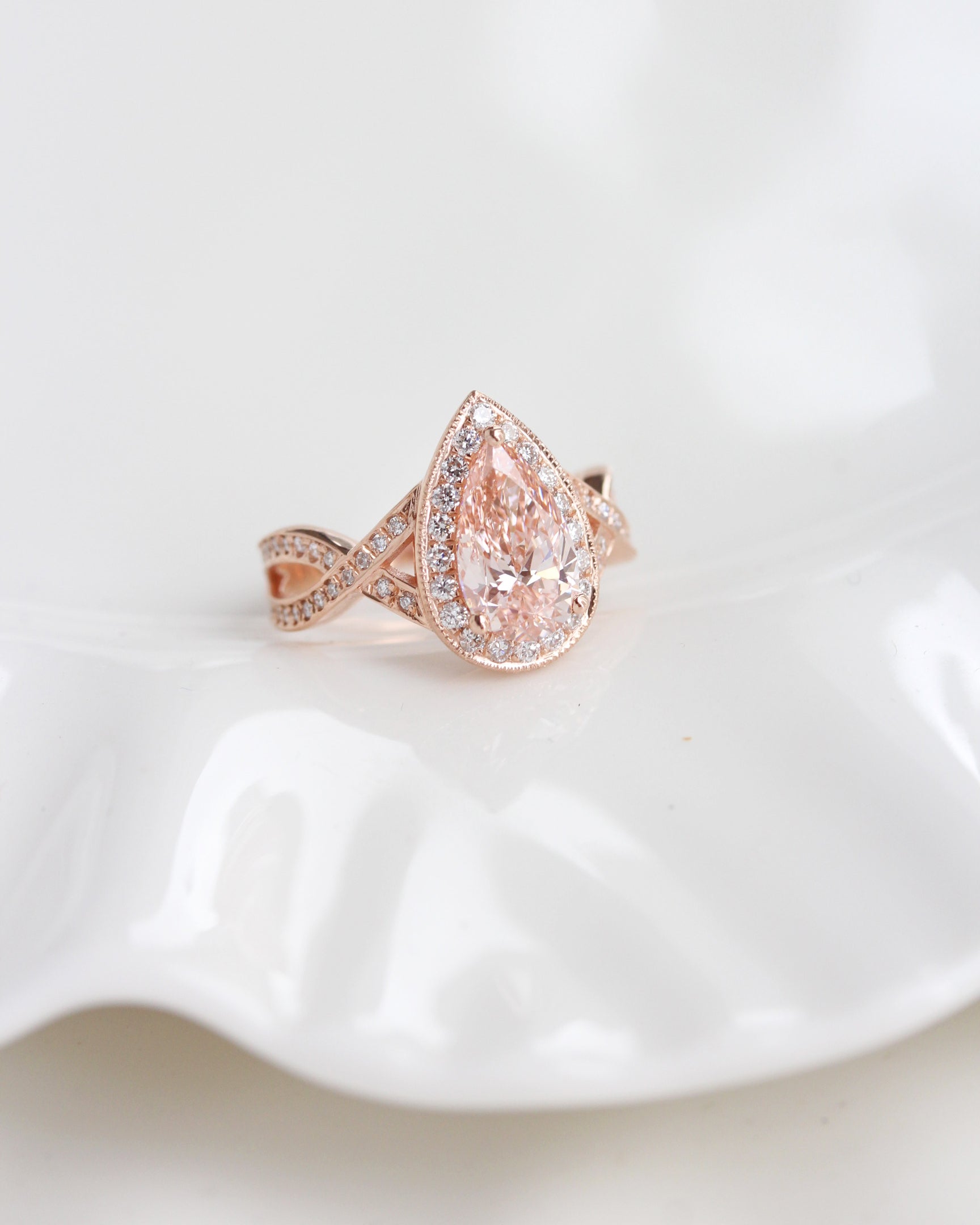 1.5ct Pink Pear Lab Diamond Halo Engagement Ring Twist Band, pear shape, pink lab grown diamond, 1.5ct, diamond halo, diamond twist band, milgrin setting