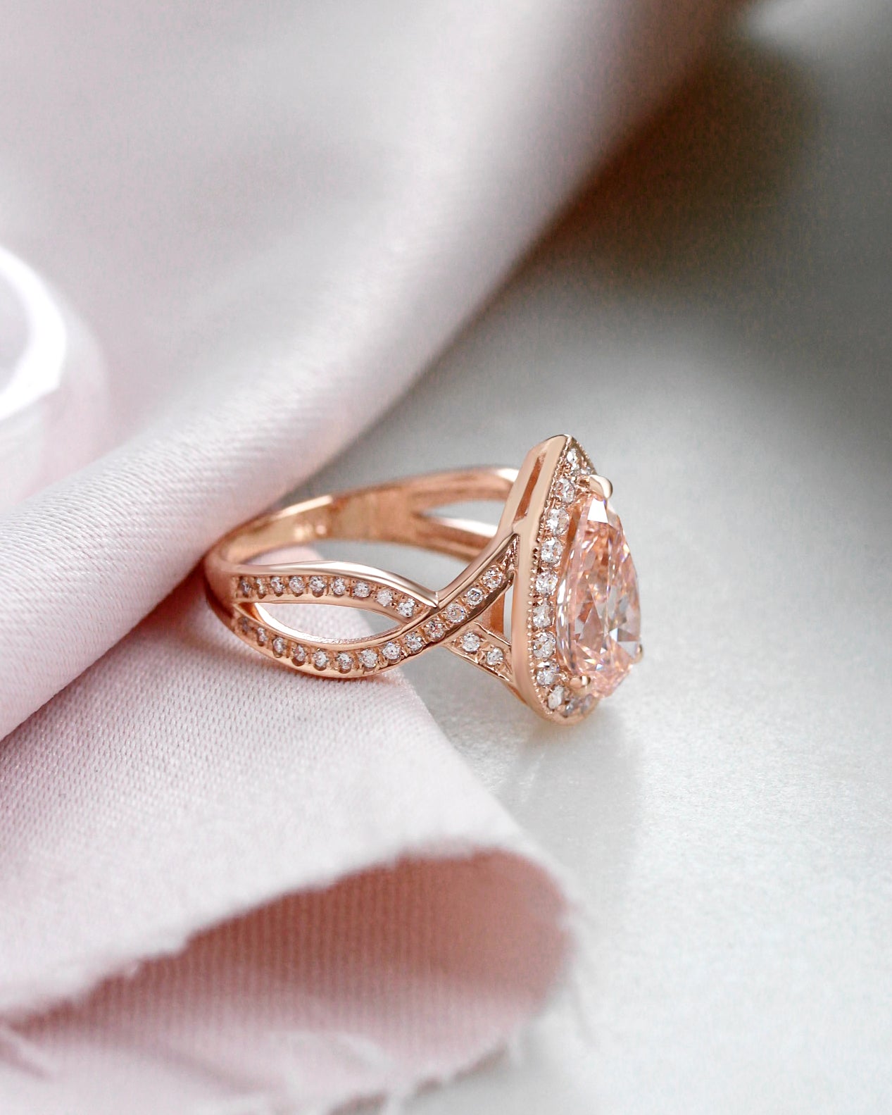 1.5ct Pink Pear Lab Diamond Halo Engagement Ring Twist Band, pear shape, pink lab grown diamond, 1.5ct, diamond halo, diamond twist band, milgrin setting