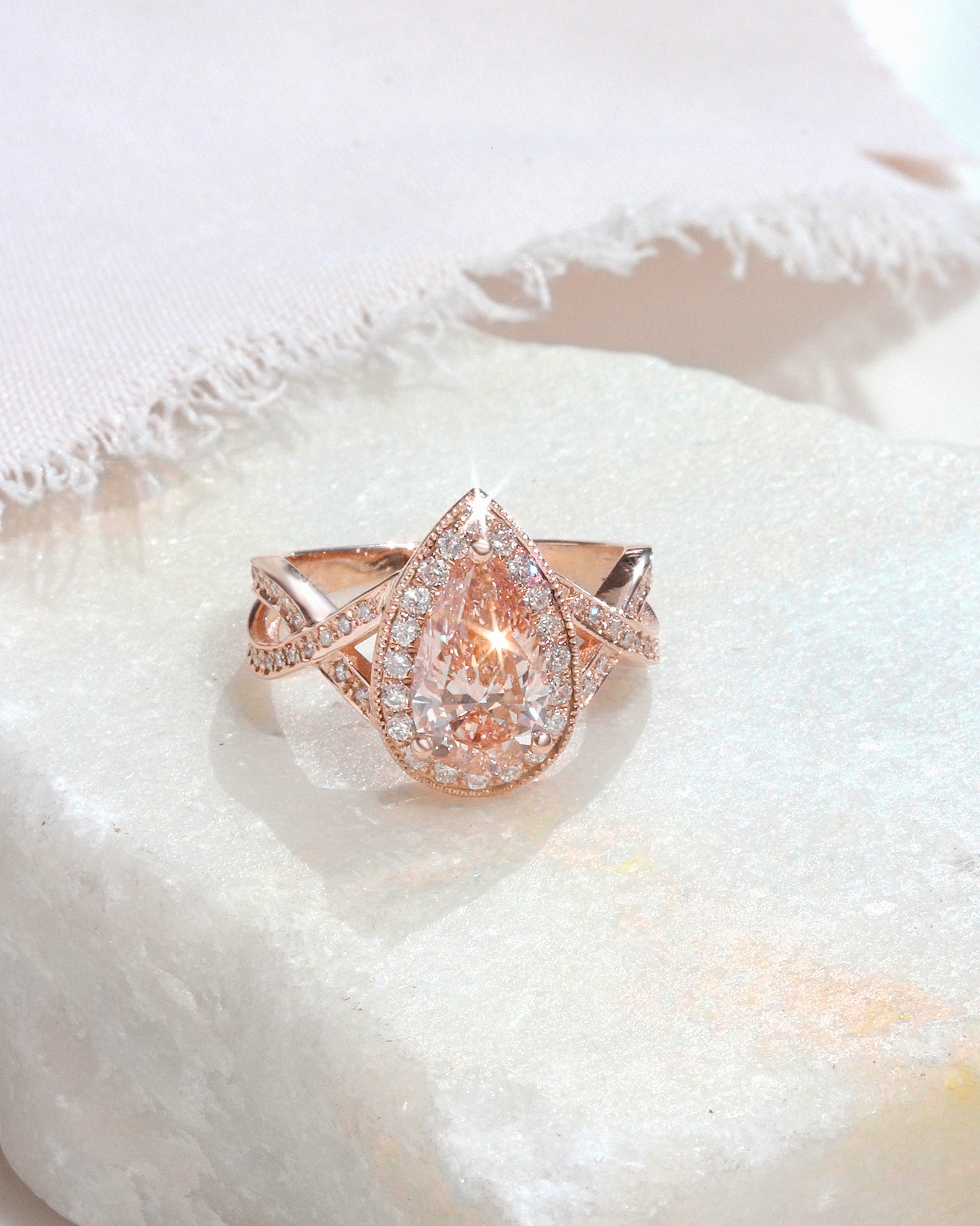 1.5ct Pink Pear Lab Diamond Halo Engagement Ring Twist Band, pear shape, pink lab grown diamond, 1.5ct, diamond halo, diamond twist band, milgrin setting