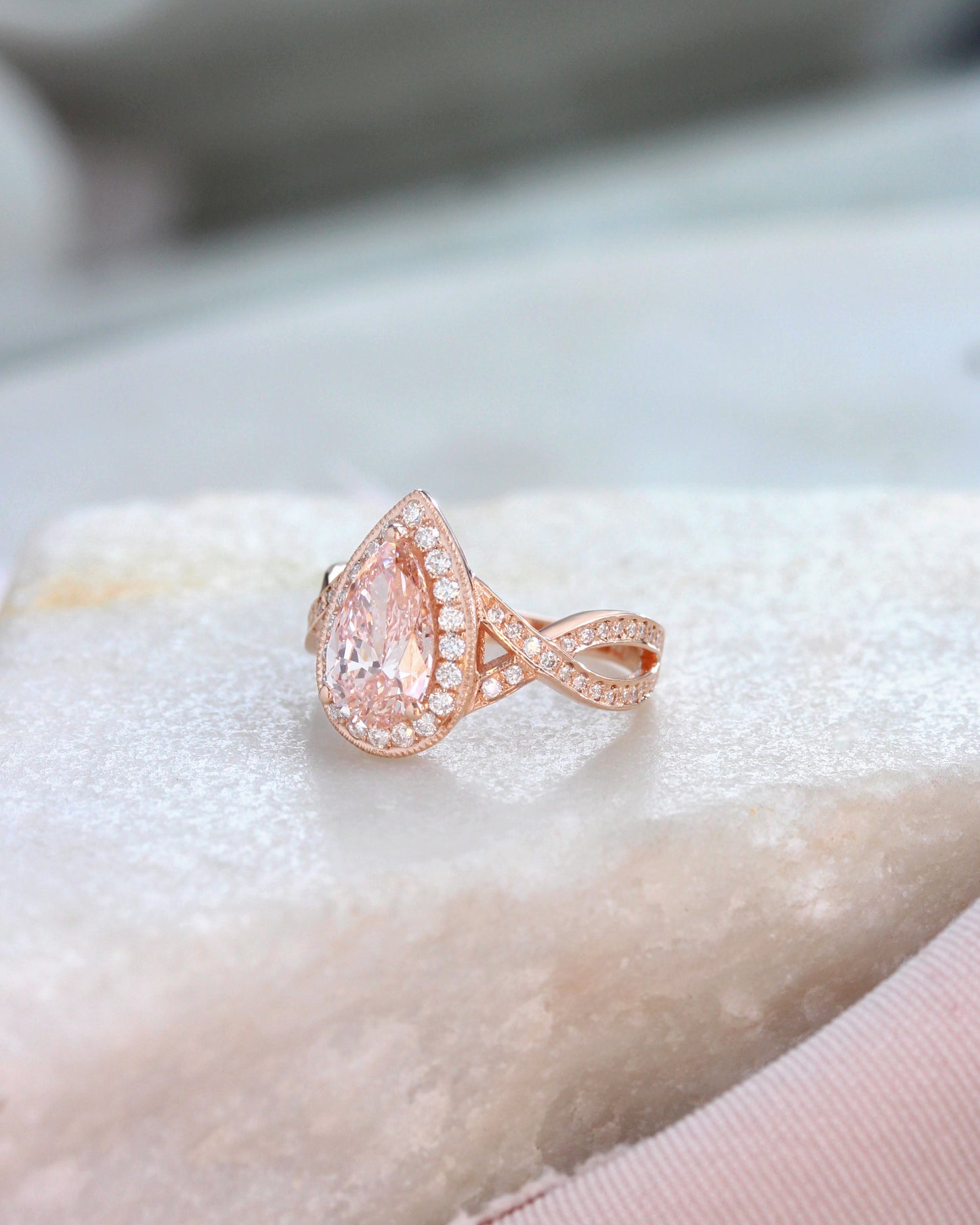 1.5ct Pink Pear Lab Diamond Halo Engagement Ring Twist Band, pear shape, pink lab grown diamond, 1.5ct, diamond halo, diamond twist band, milgrin setting