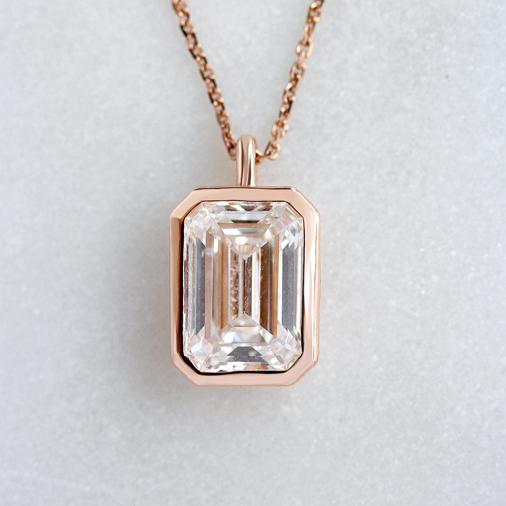 2ct Emerald Cut Lab Grown Diamond Bezel Set Pendant Necklace, bezet setting, emerald cut diamond,pendant, modern, elegant, minimal, confortable, low profile.