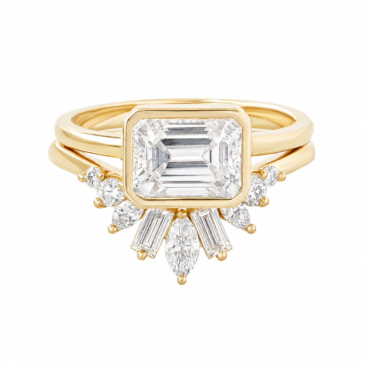 A yellow gold ring featuring a large rectangular emerald-cut diamond center stone with a sunburst arrangement of smaller baguette and round diamonds, shown on a plain white background.