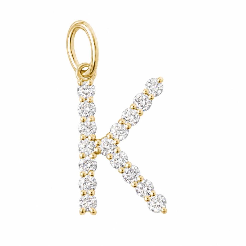 large diamond initial K yellow gold 
