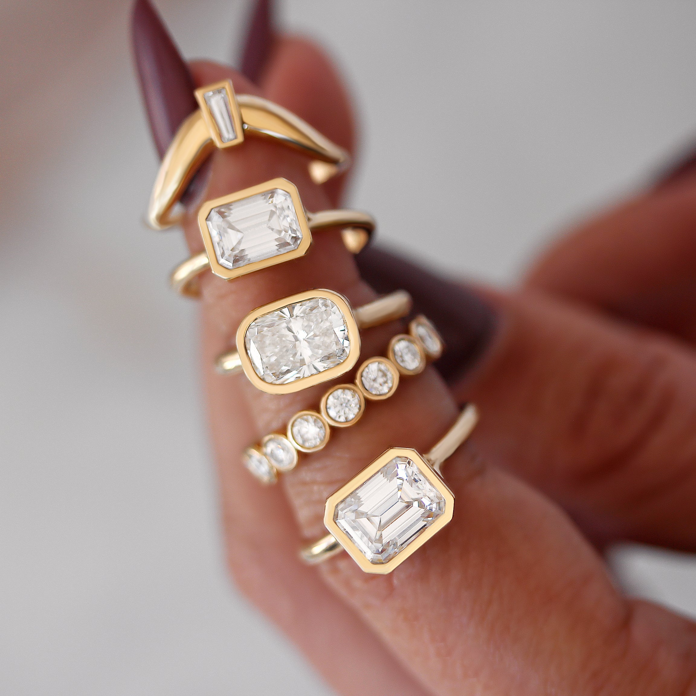 east west bezel set diamond solitaire engagement rings 