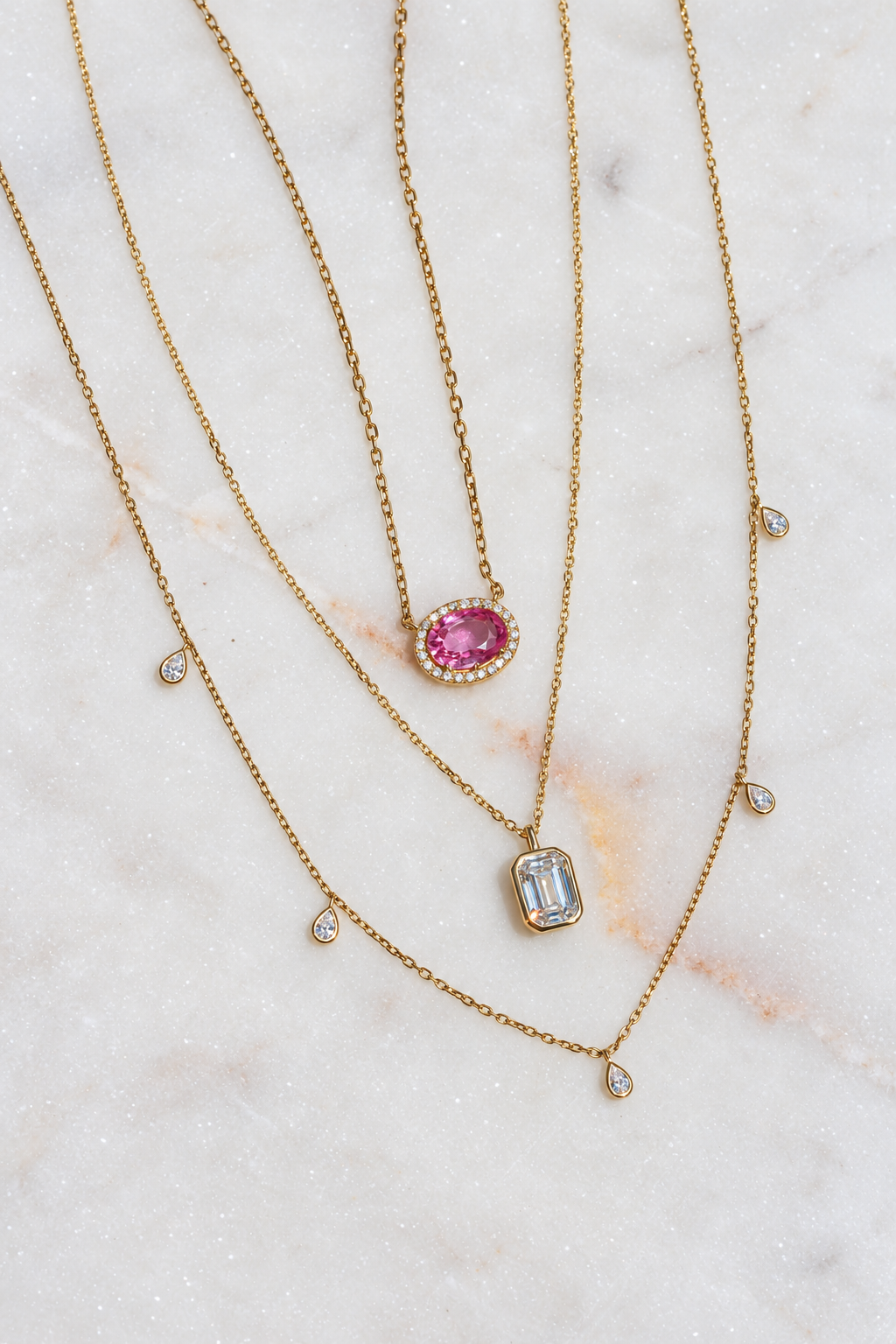 Oval Pink Sapphire and Diamond Halo Pendant Necklace