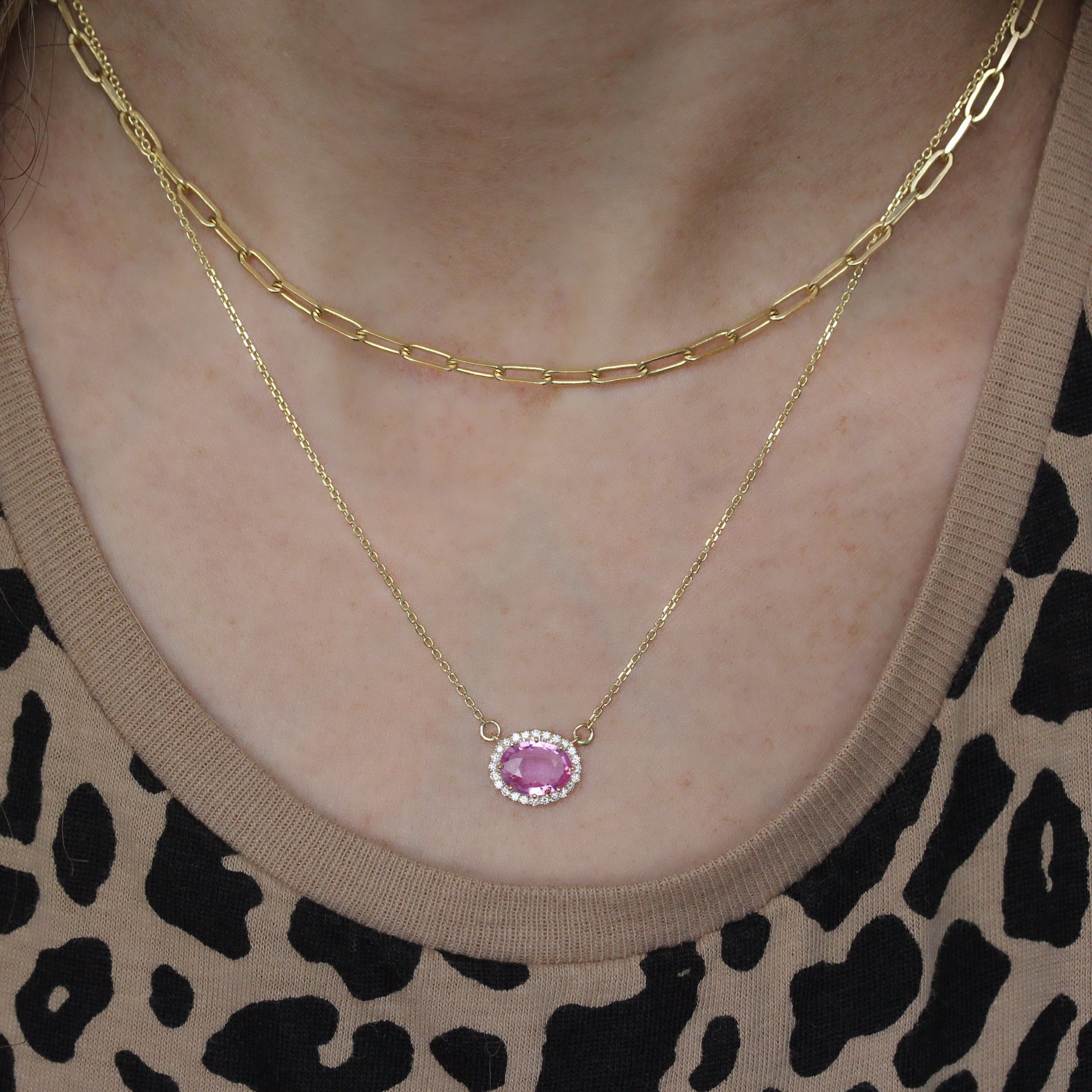 Oval Pink Sapphire and Diamond Halo Pendant Necklace