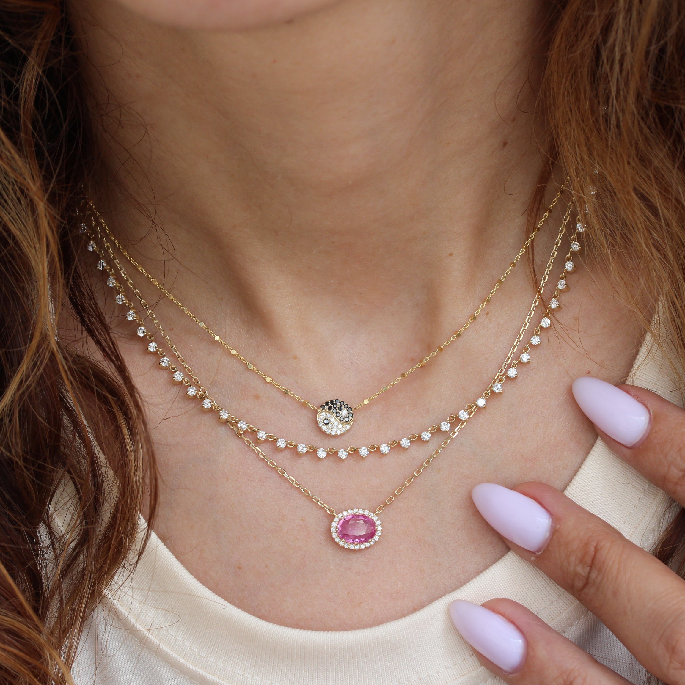 Oval Pink Sapphire and Diamond Halo Pendant Necklace