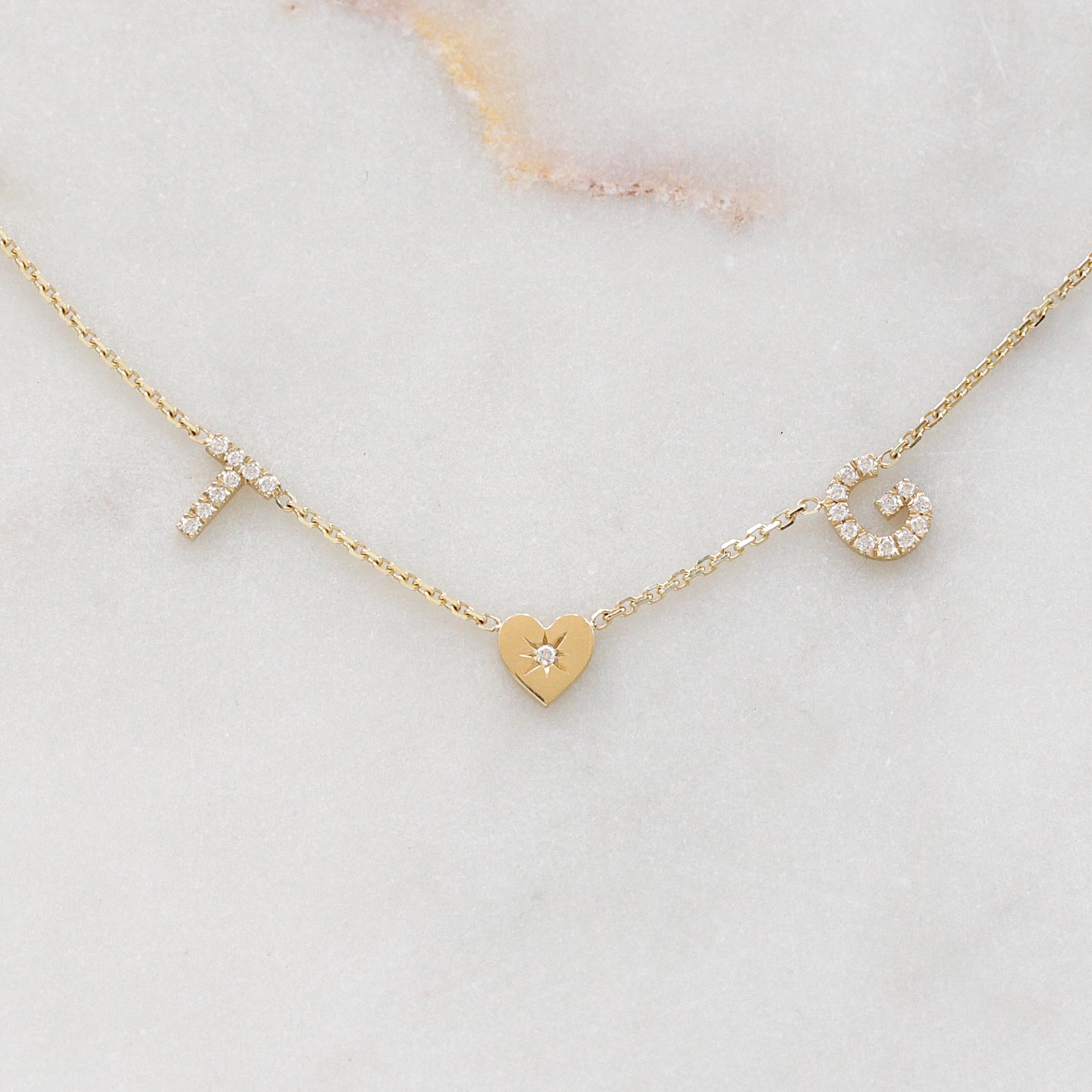 two diamond initials a heart yellow gold diamond personalized name necklace
