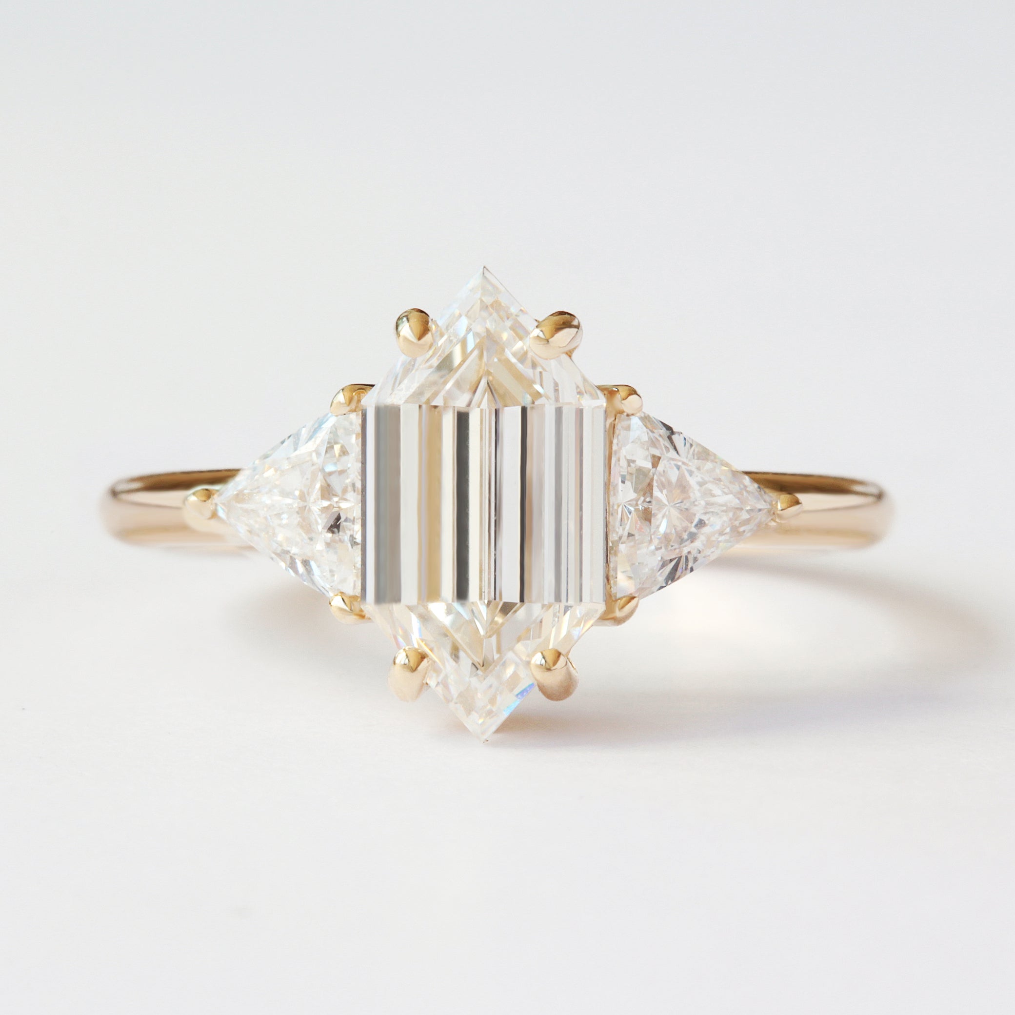 Elongated Hexagon Diamond Three Stone Engagement ring