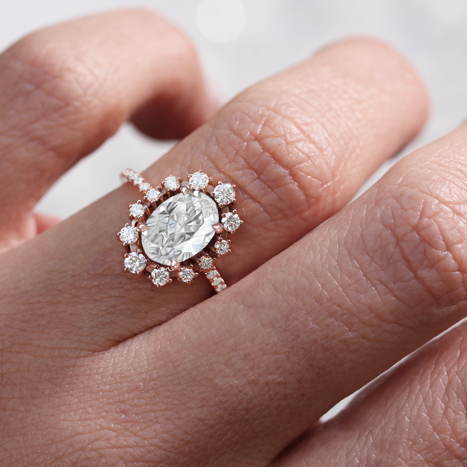 oval moissanite engagement ring rose gold