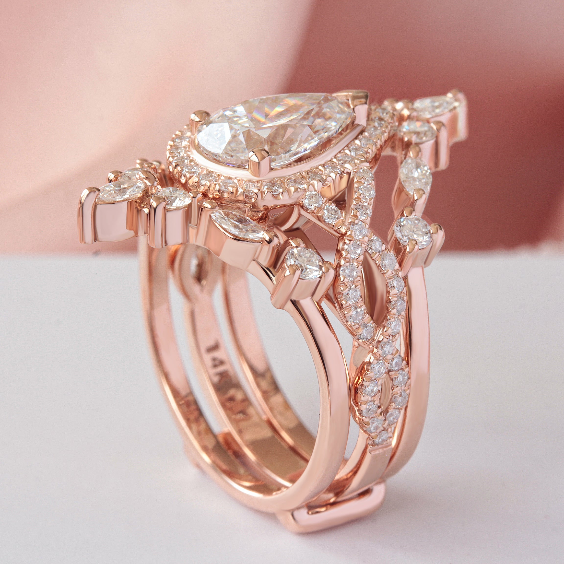 1.5 carat Pear Diamond Twist Shank Halo Engagement Ring Romeo