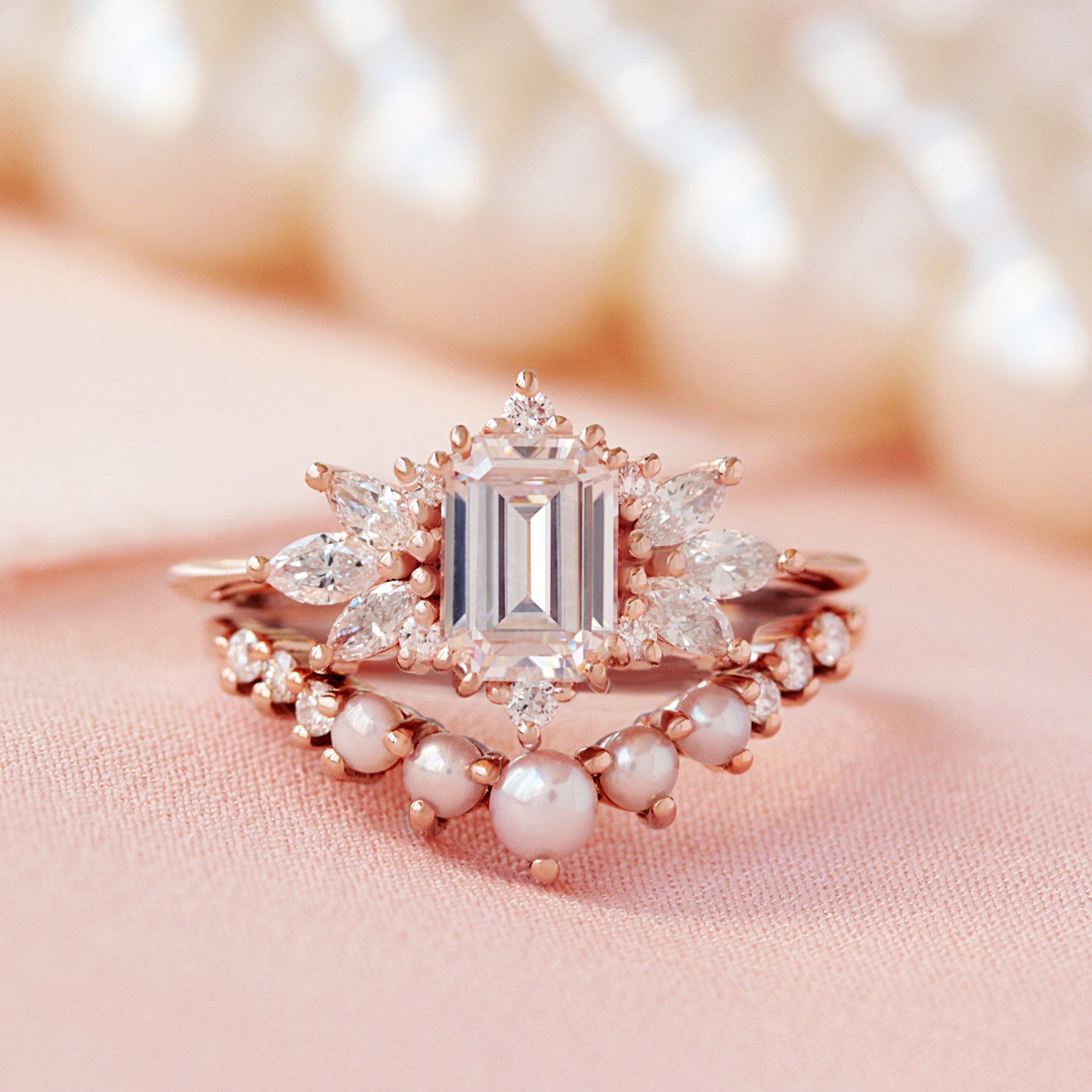 emerald cut ring and v ring with pearls and diamonds